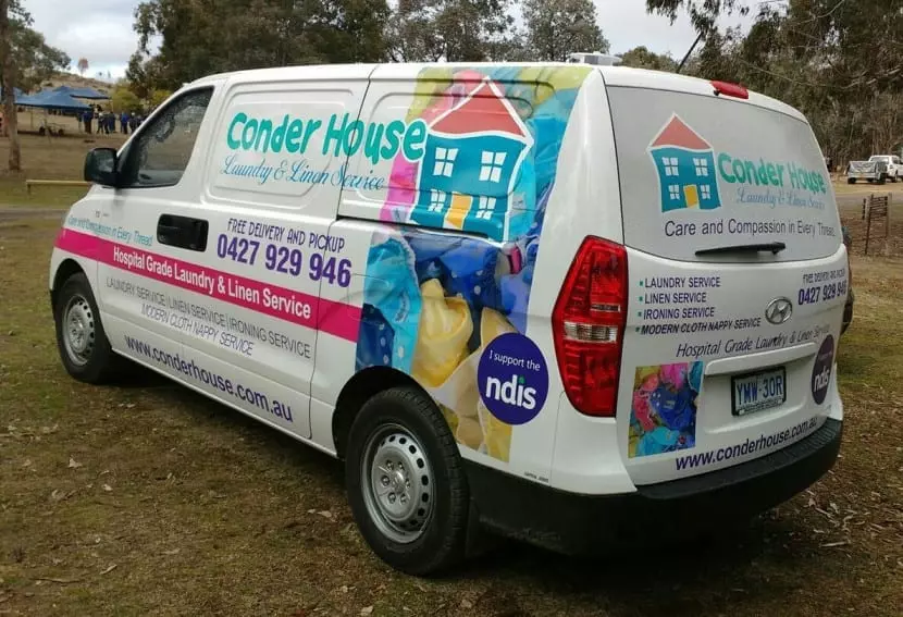 A van with Conder House Laundry and Linen Service branding.